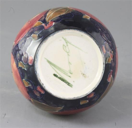 A Moorcroft pomegranate pattern baluster vase, height 6.75in.